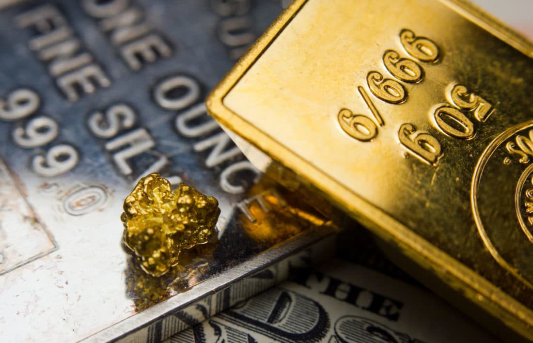 Troy ounces of hold and silver gold
