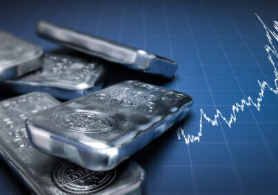 3d,Illustration,Of,Silver,Bullion,Bars,Over,A,Blue,Background